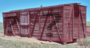 Cattle car from an unknown railroad company photographed on the plains of eastern Colorado, 1983
