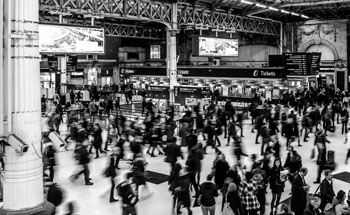 Photo of busy train station by Josh Hild from Pexels